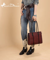 Montana West tool tote bags in black— synthetic leather with floral embossing and tassel